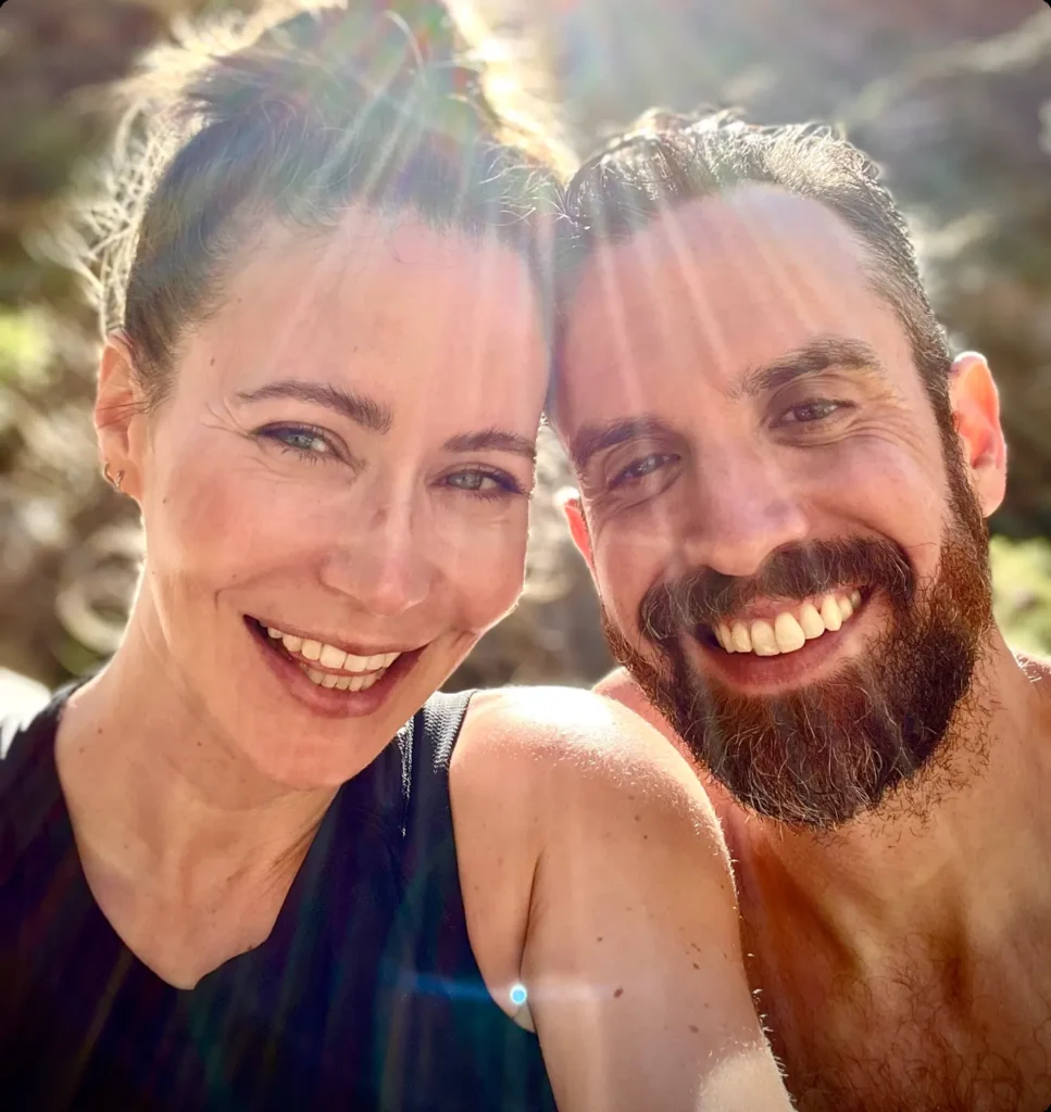 Moonflower Guide Co guides Tina and Axel smiling in Aravaipa Canyon